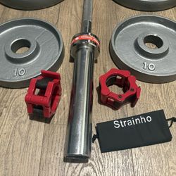 IVANKO’s  Olympic Weight Plates  (45s, 35s, 25s & 10s) In New Condition; Plus Titan 6ft Bar. Total: 270 lbs.