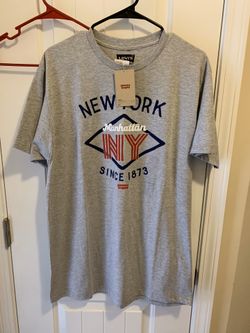 Levi’s New York T-shirt size is men’s Large