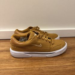 Nike Low-Top Sneakers in Mustard/Gold with White Swoosh