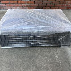 Black wicker style coffee table with glass top for outdoors - New in box