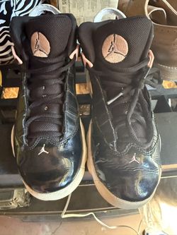 Girls Pink And Black Jordan’s