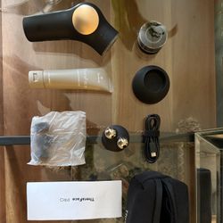 Therabody Theraface Pro Black and Gold Facial Toning Kit