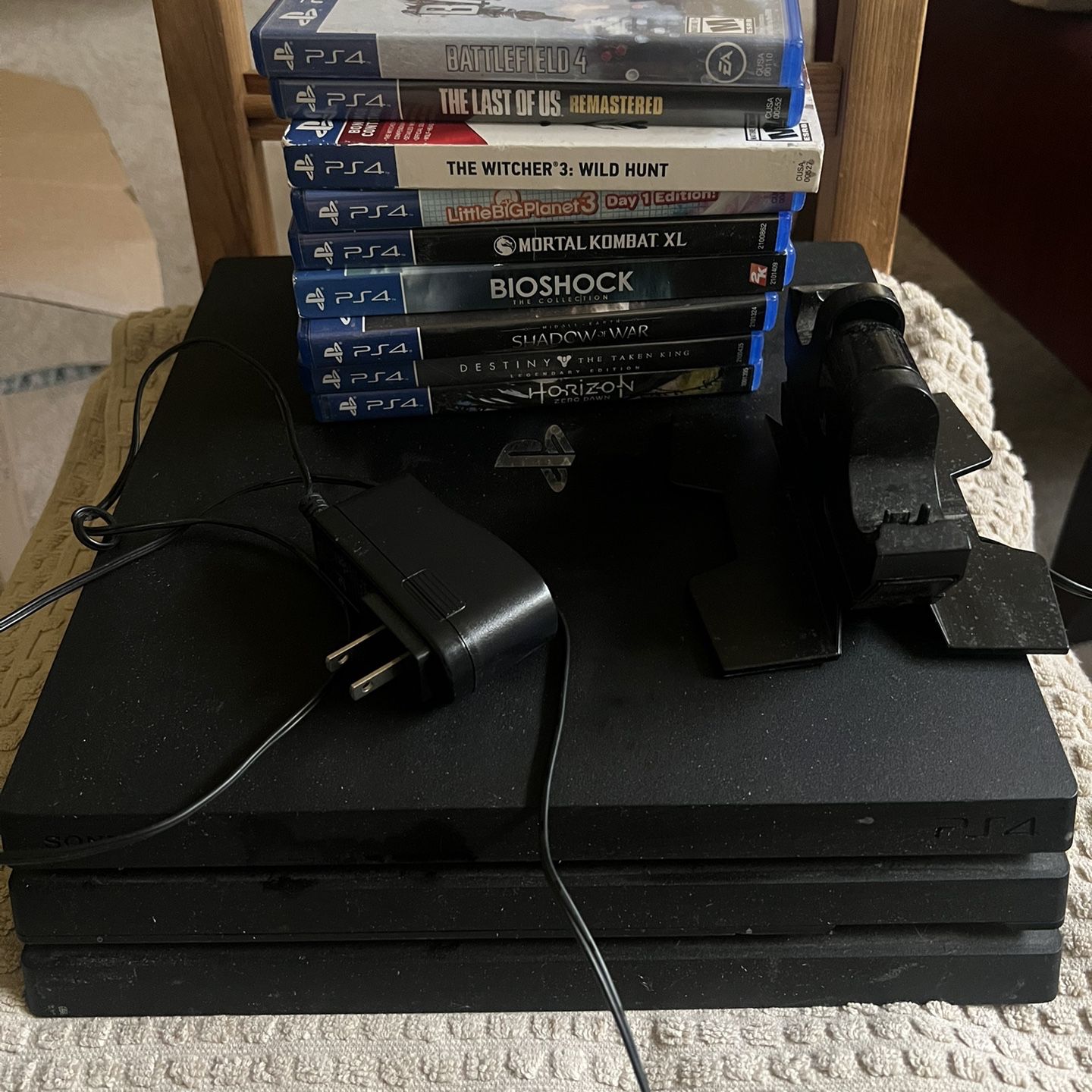 PS4 Pro Console, Assorted Games, Dual Controller Charger