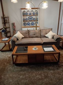 Solid oak coffee table and end tables.