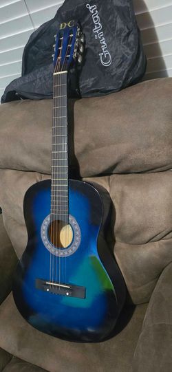 ACOUSTIC GUITAR $49