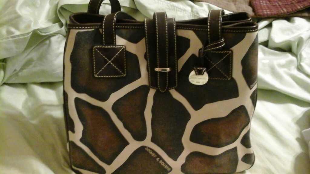 Dooney and Bourke giraffe print purse for Sale in Arlington TX
