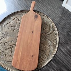 Wooden board for charcuterie or decoration.