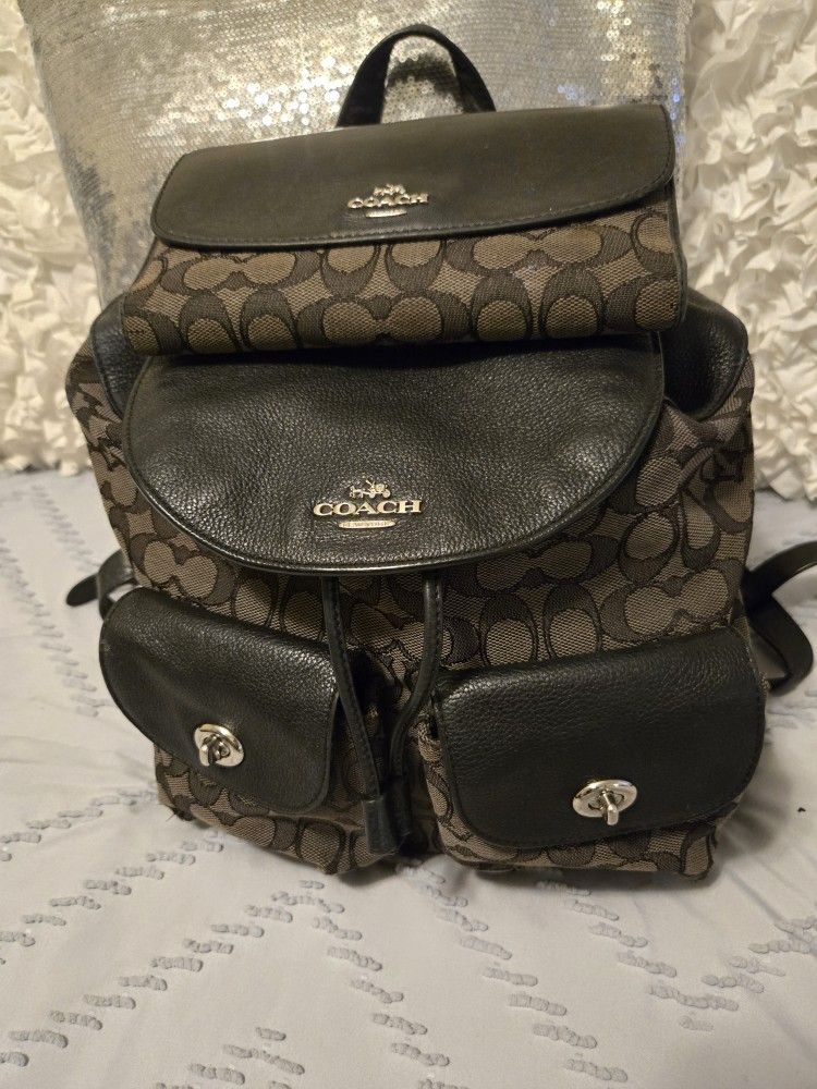Michael Kors Back Pack with matching wallet.