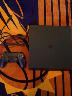 Playstation 4 slim + Controller and power cord ready to play