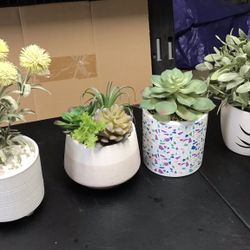 4 life-like faux succulent arrangements