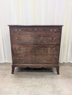 Hathaway's Dark Wood Four-Drawer Dresser with Ornate Hardware