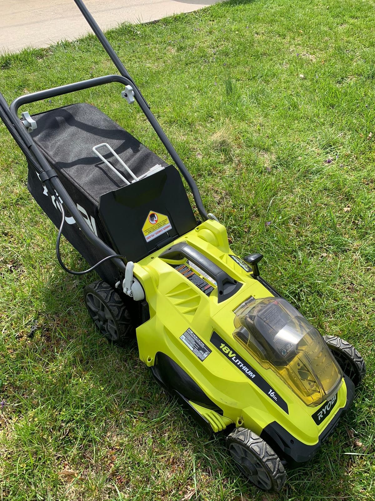 Fairly used Ryobi one+ lawn mower 16in. 18 lithium cordless battery with 2 rechargeable batteries
