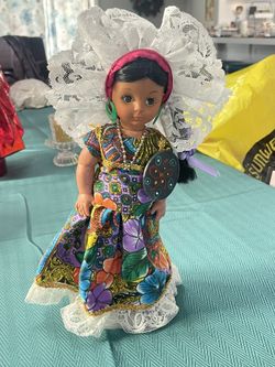 A traditional Mexican folk art doll from Chiapas in colorful attire. 11” Tall