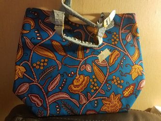 Quality handmade leather bags covered with African fabrics.