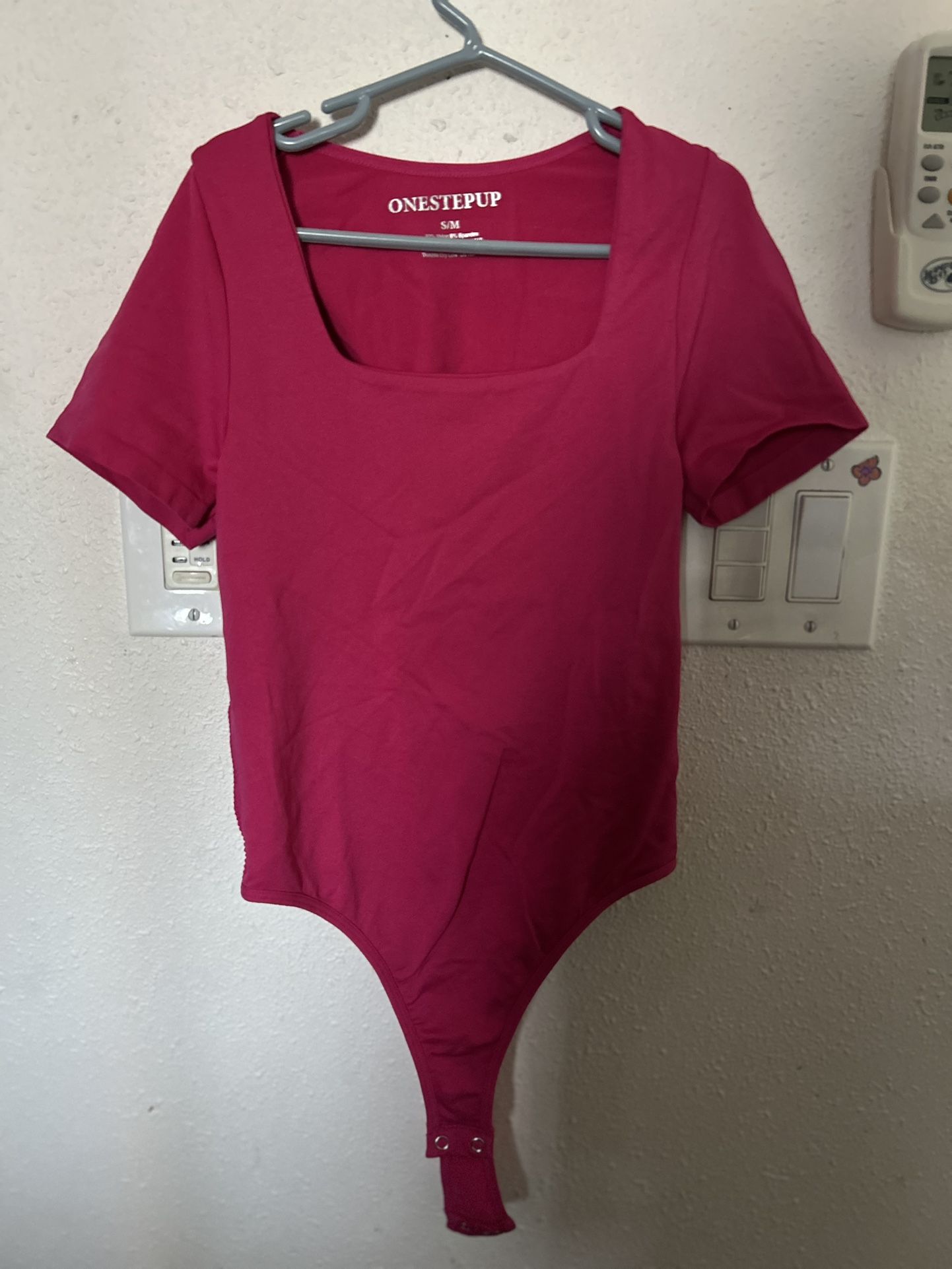 Woman’s Pink Bodysuit