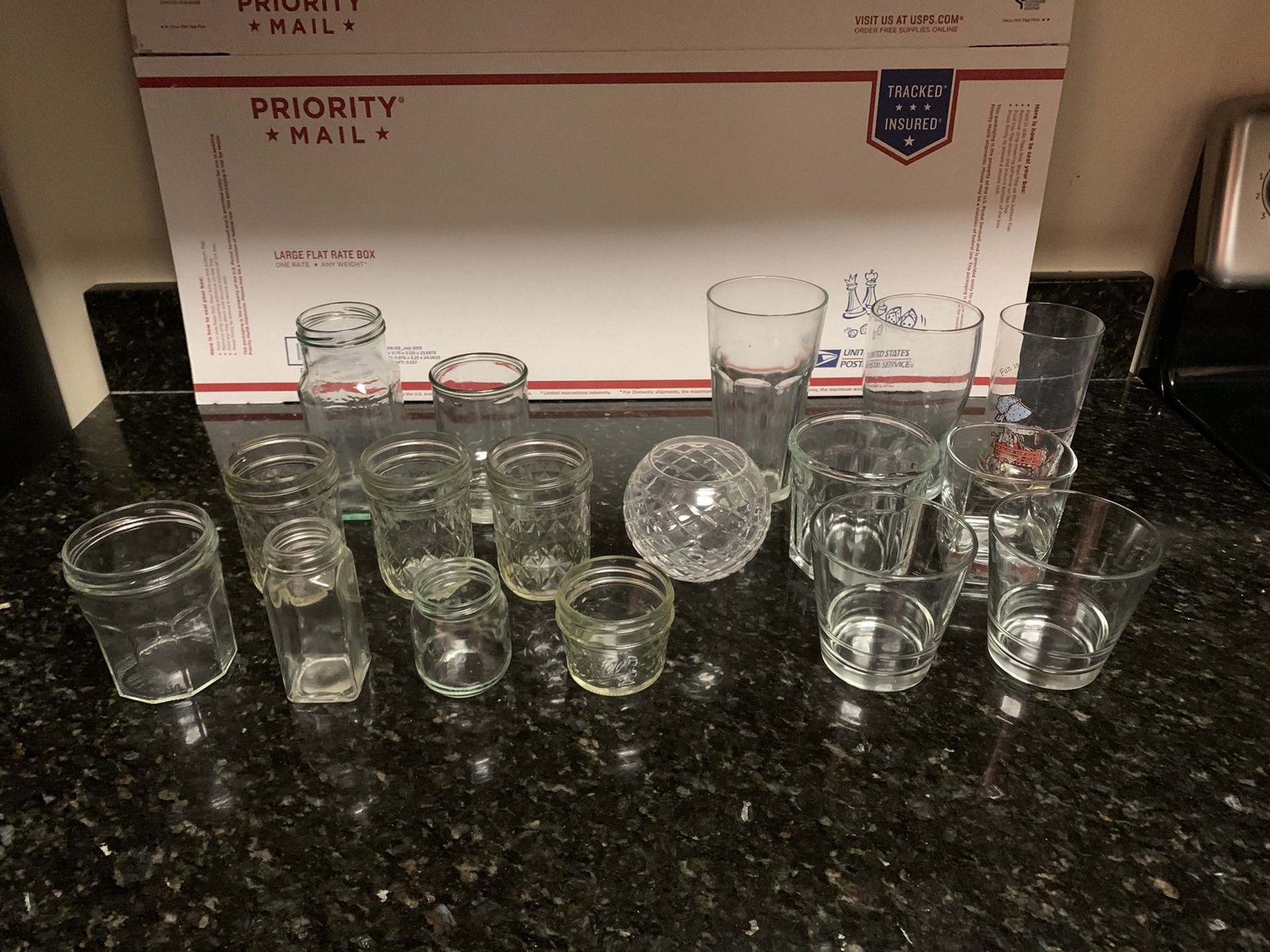 Lot of 17 Assorted Glassware Including Jars and Drinking Glasses