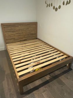 Pottery Barn wooden bed frame (queen)