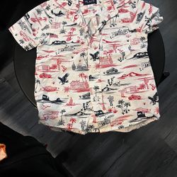 Children's Place Boys' Short Sleeve Print Poplin Button Up Shirt with a "USA Road Trip" or "Americana" print. 