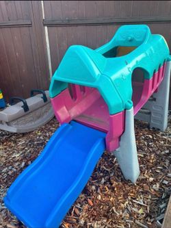 Rocket ship slide and see saw