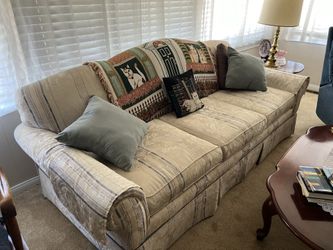 Couch And Cherry Wood Tables