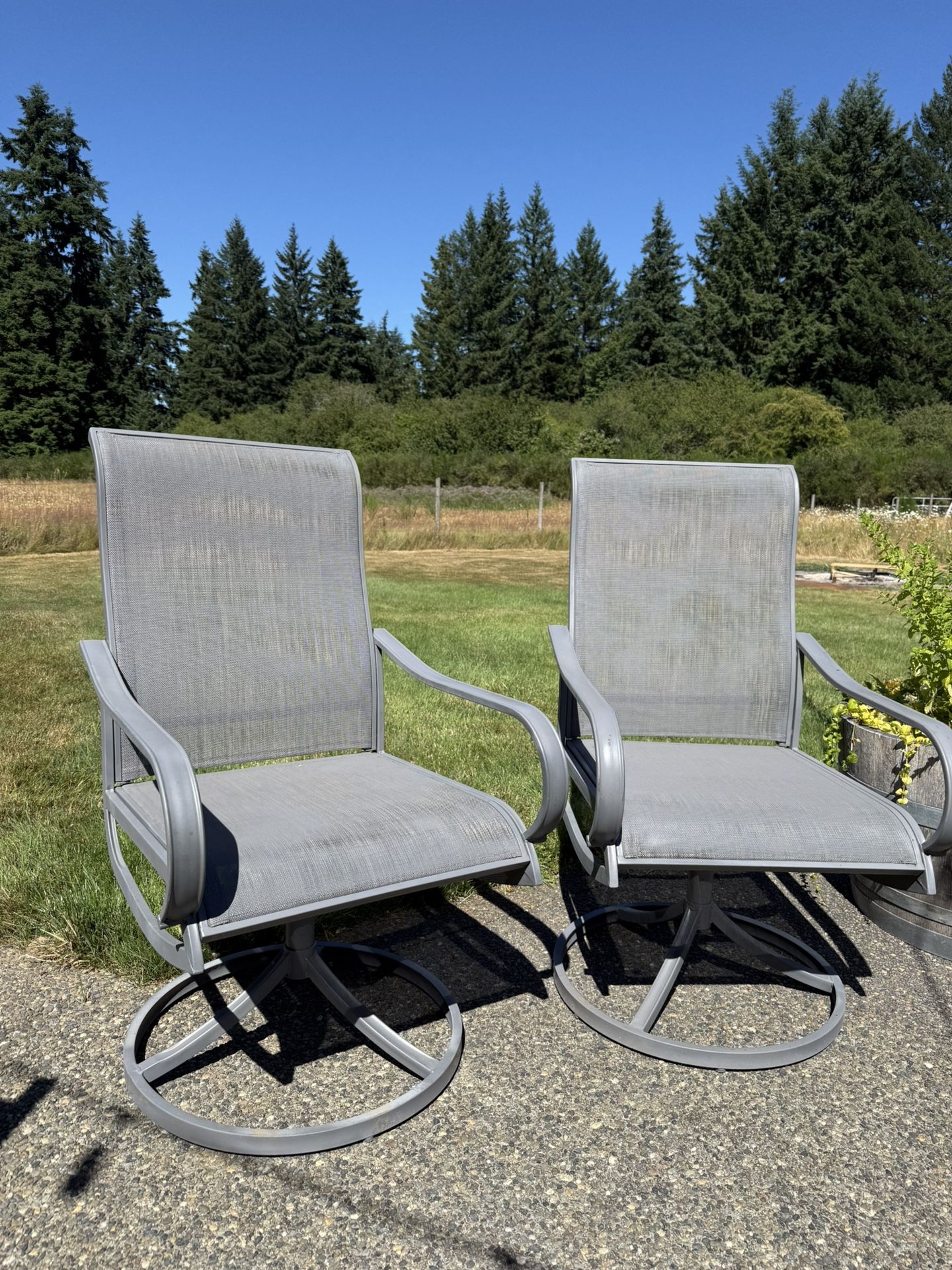 Four (4) Swivel Patio Chairs Gray