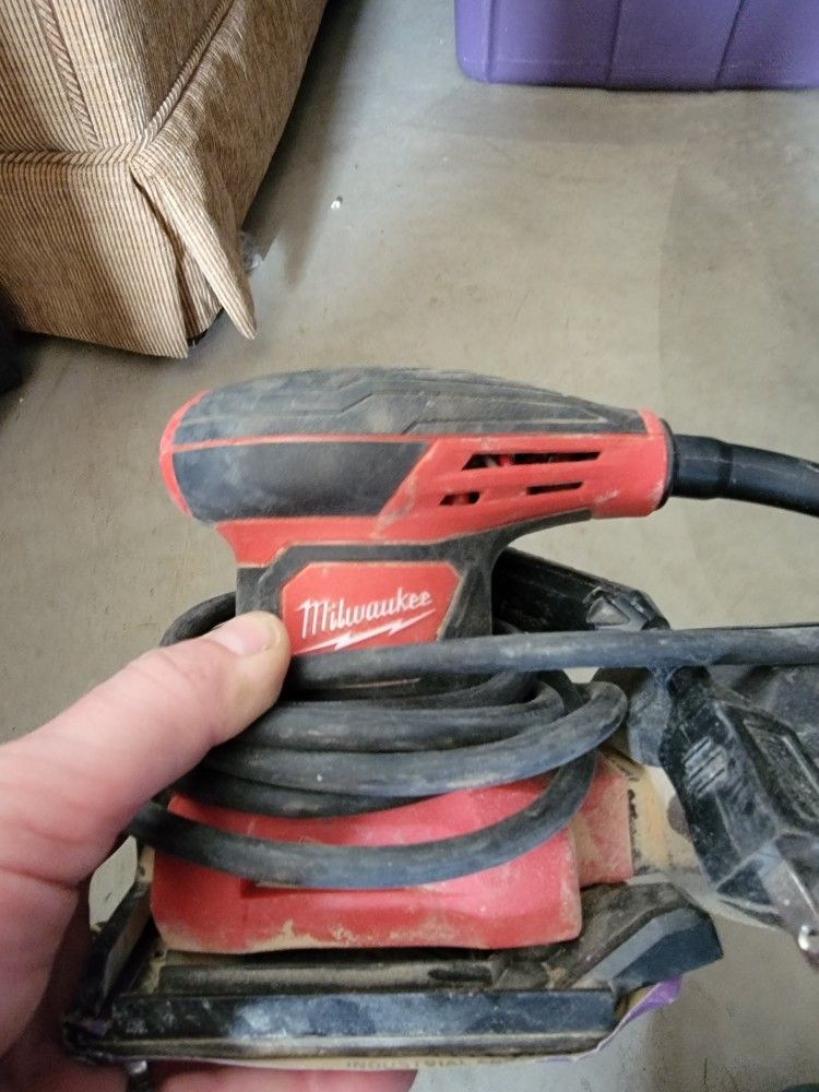 Milwaukee Palm Sander.