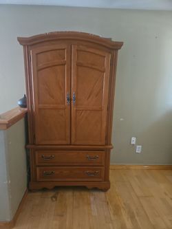 Brown wooden dresser/chest