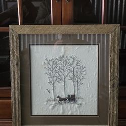 Vintage framed needlepoint or cross-stitch artwork depicting an Amish country scene