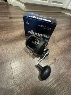(Murrieta) New in box  Okuma 45 star drag line counter conventional salt water fishing reel.