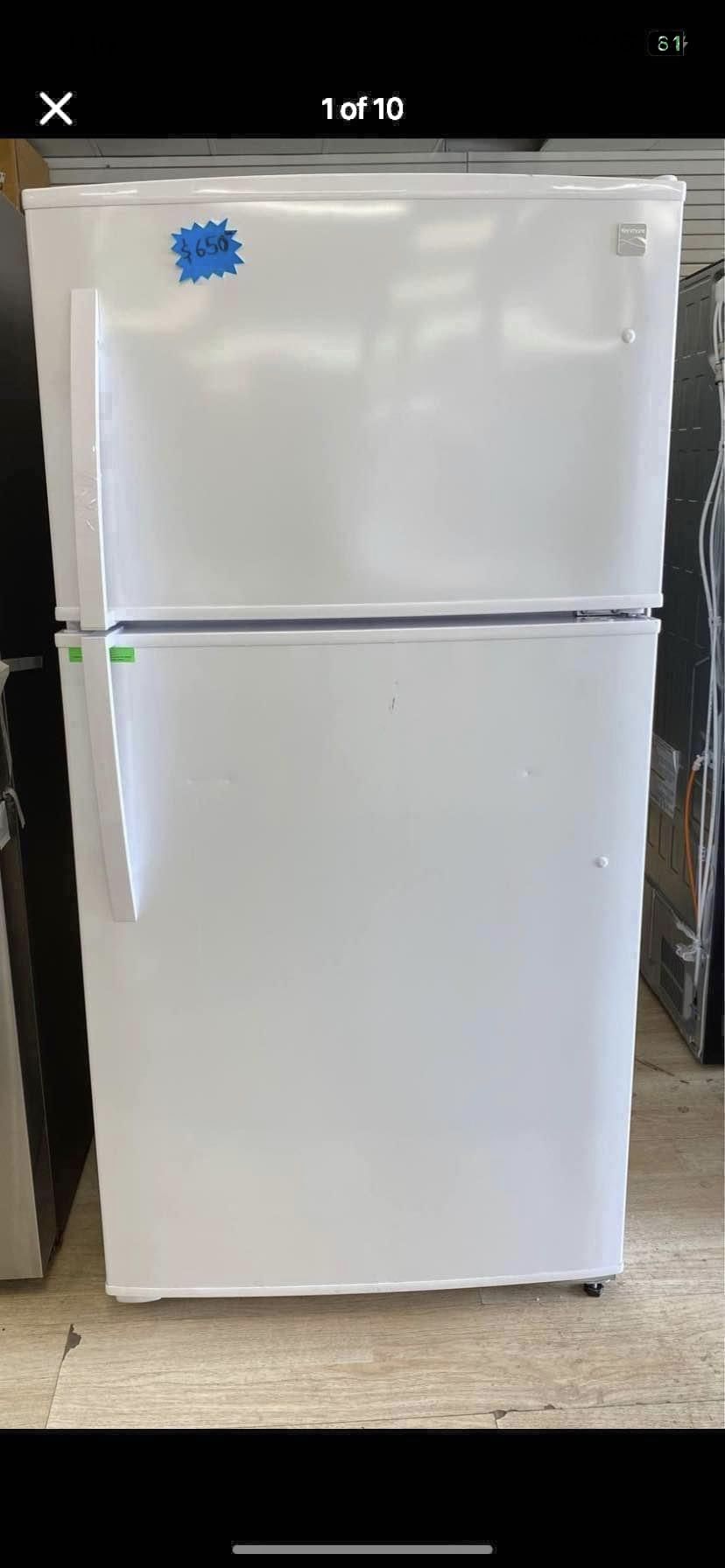 $474, (regular price is $1,250) Kenmore 71212 21 Cu. Ft. Top-Freezer Refrigerator With Ice Maker - White