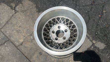 One appliance wire mag 15x8.5-inch alloy rim. 5 on 4.75 lugs chevy