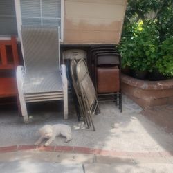 Metal Folding Chairs  4 Brown Two Gray ,1 White One Light Gray 