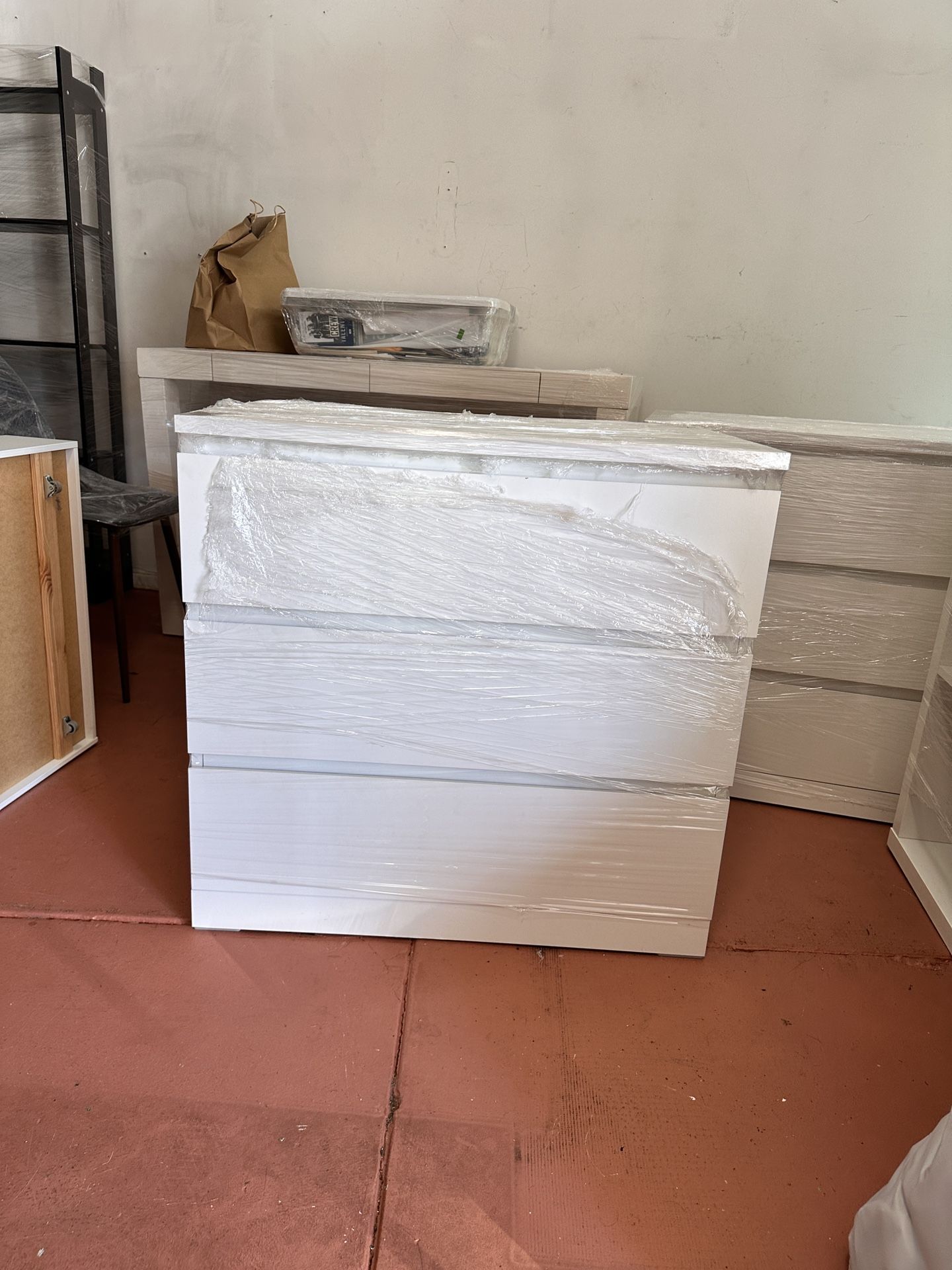 Three IKEA STORKLINTA 3-Drawer Chests