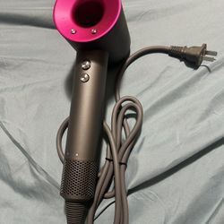 Dyson Hair dryer with attachments