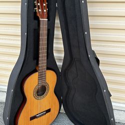 Paracho Acoustic Guitar with Hard Case.   Appraised at Guitar Center $210 w/out Hard Case ($100). Total Savings $155.