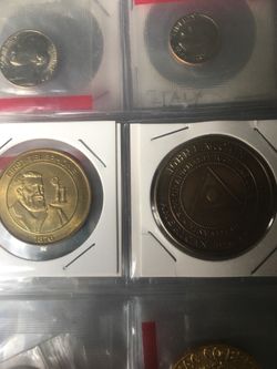 4 assorted tokens coins