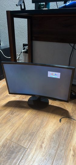 Samsung curved 24 inch monitor. (plastic is chipped)