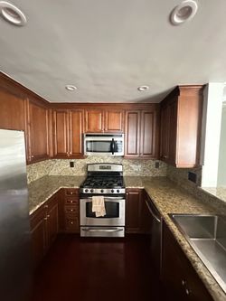 GE Appliances - refrigerator, stove, microwave