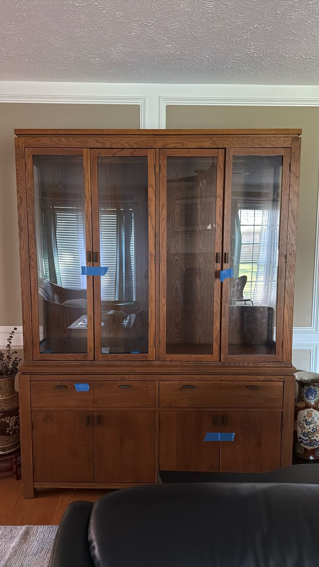 China Cabinet In Good Condition. It Has A Two Glass Shelf Each Side
