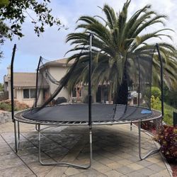 SKYWALKER TRAMPOLINE 15 foot ROUND with blue padding enclosures