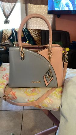 Purse three compartment and one in the bag that makes it four