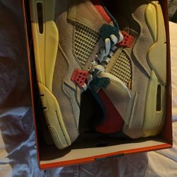 Jordan 4 Retro Union Guava Ice