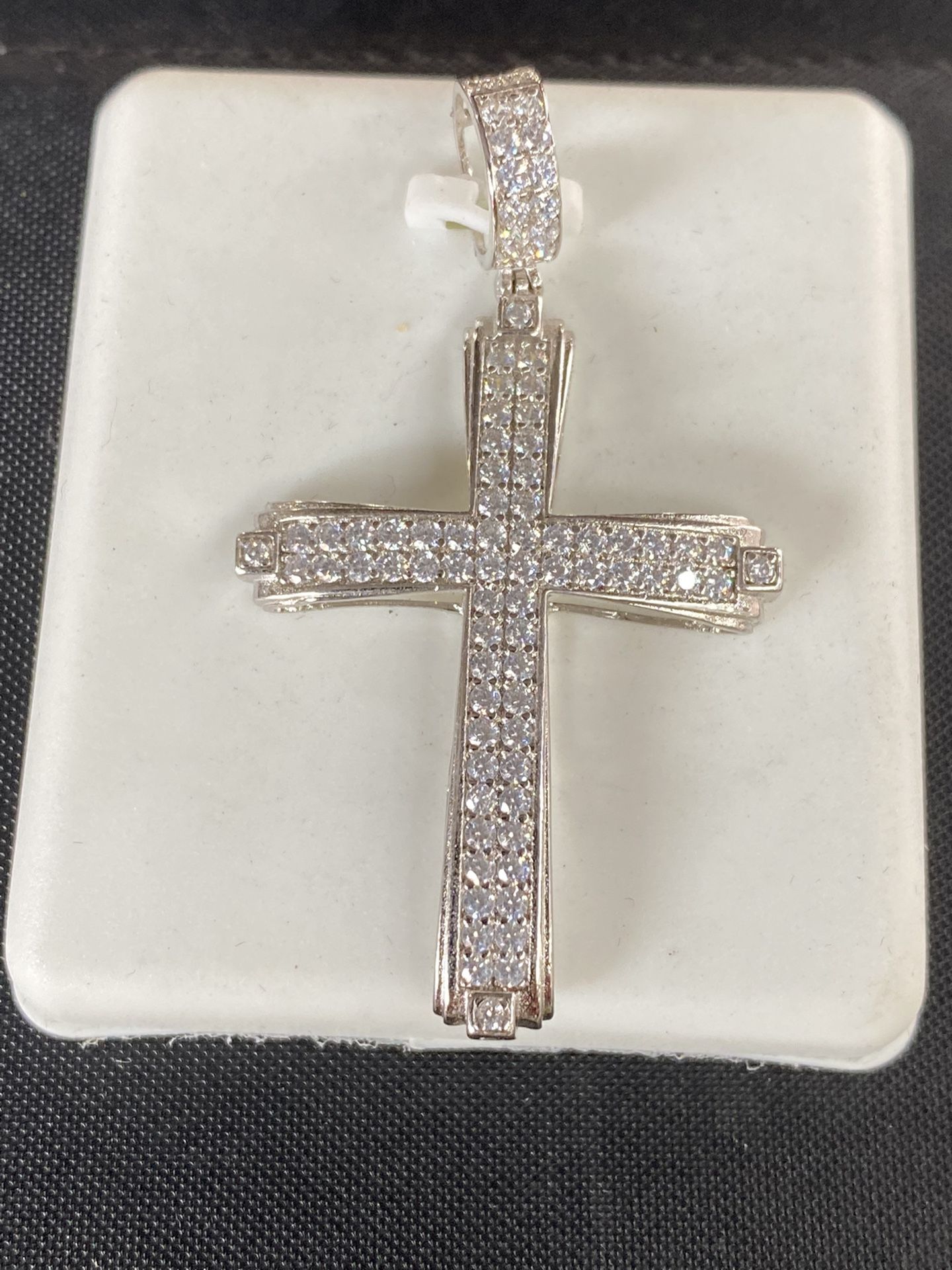 Brand New 9.25 sterling Silver Cross Which The Stone’s And The All Cros Is 2”