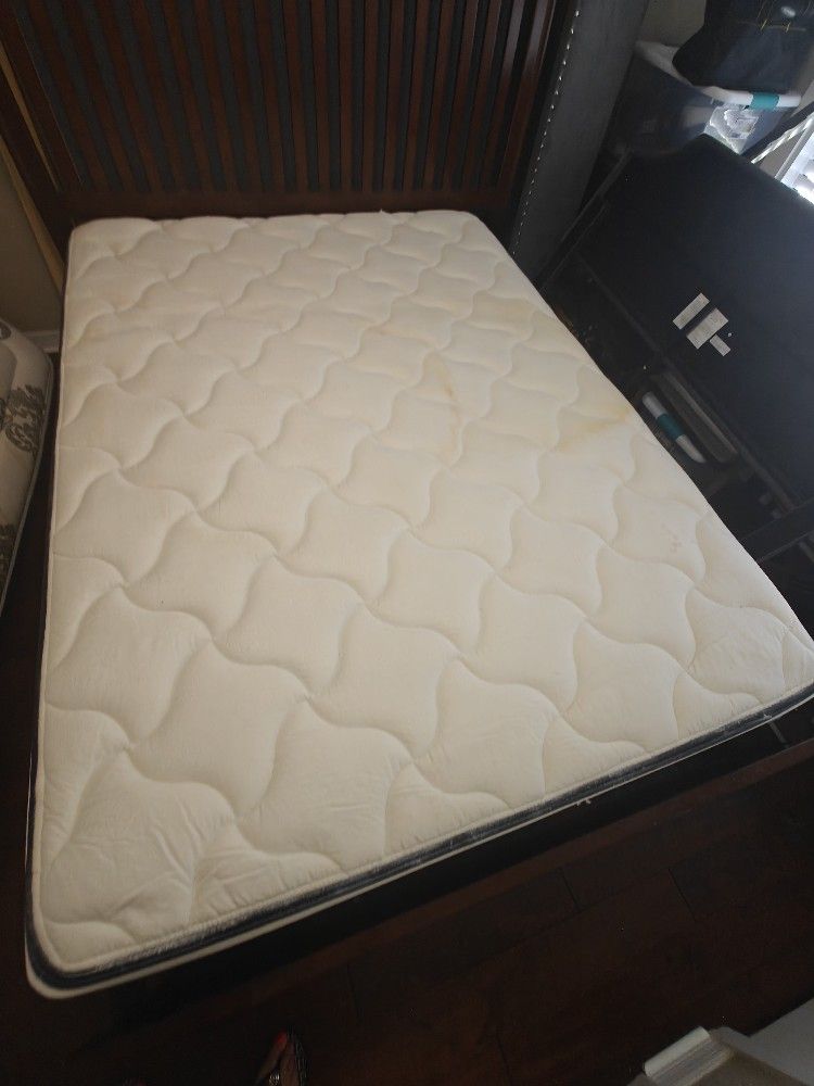 Free  Queen Matress  & box spring
