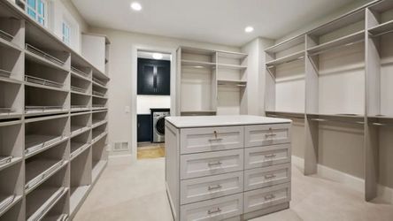 Master Walk-In Closet, Color Grain Wood Color, Raised Panel Drawer Fronts, Everything is Adjustable