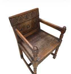 Antique Hand-Carved Wooden Armchair With Intricate Floral Detailing & Gothic Arc