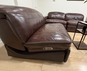 Brown leather recliner couches from RC willey.