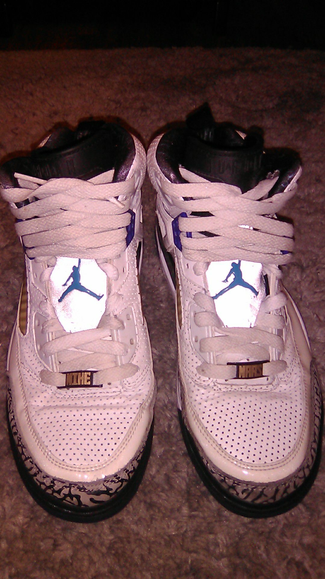 Jordan Mike Mars edition size 7.5. A tiny bit of cracking on the left shoe see pictures.
