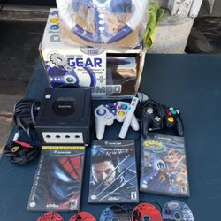 Nintendo GameCube with 5 Adult Kids Games. 2 Controllers. 1 Mic. 1 Racing Kitt game cube Console. $300! Lowest I accept Cash & trade. Free Delivery in