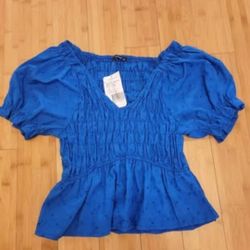 Brand new womens shirt size Large . Stretch material 